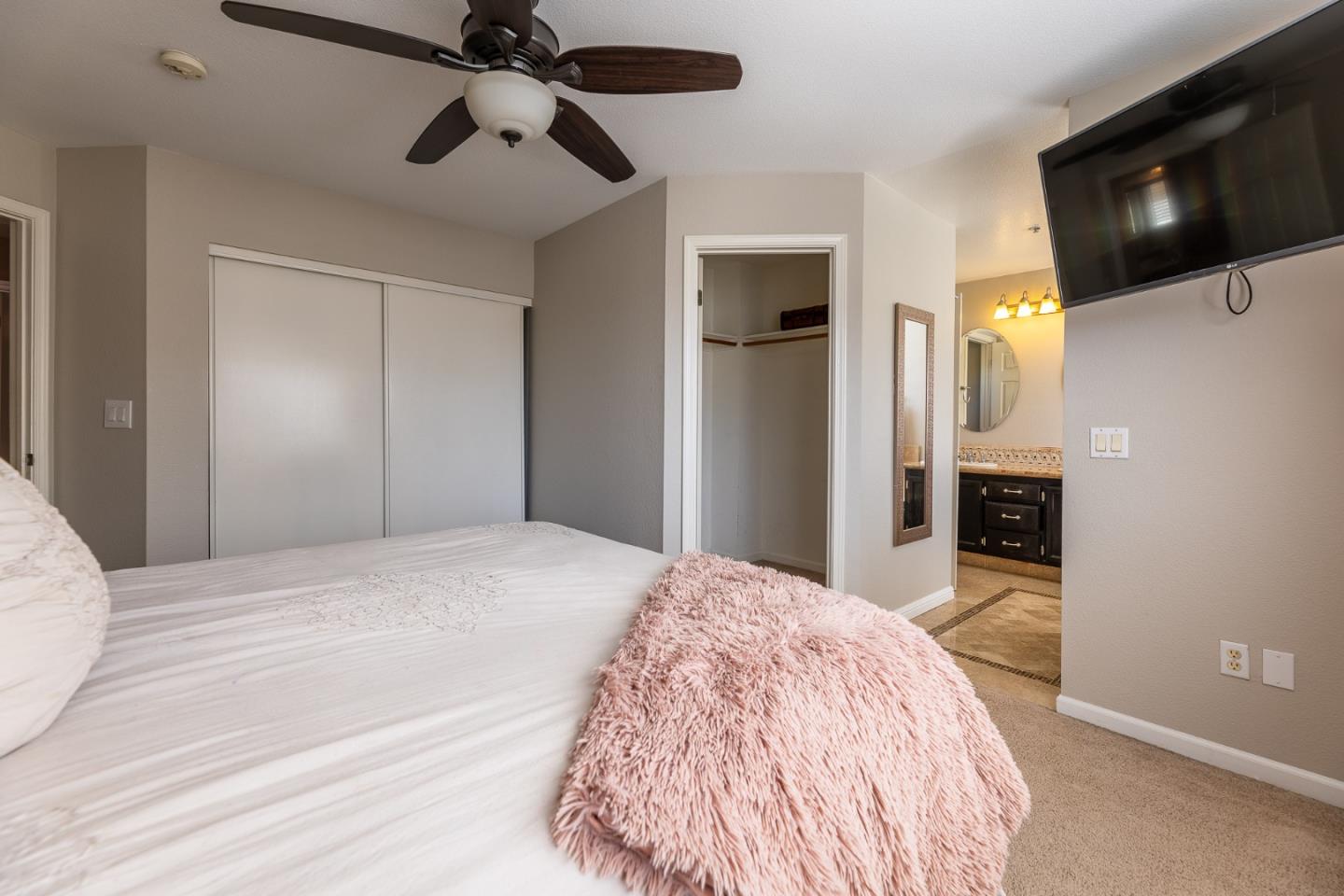 1118 Eagle Drive Salinas, CA 93905 - Photo 17 of 30 a bedroom with a bed and a television