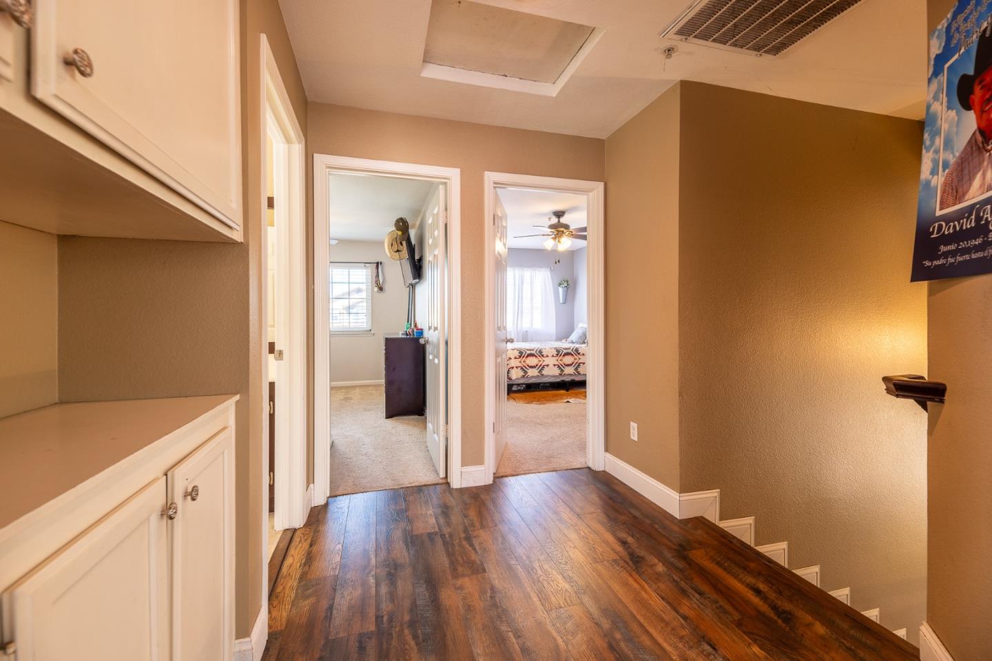 1118 Eagle Drive Salinas, CA 93905 - Photo 22 of 30 a view of a hallway with wooden floor