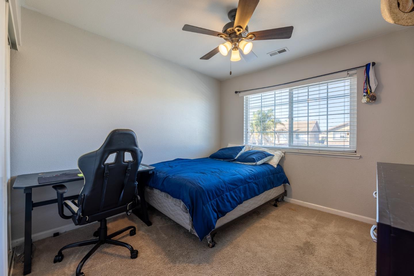 1118 Eagle Drive Salinas, CA 93905 - Photo 25 of 30 a bedroom with a bed and a window