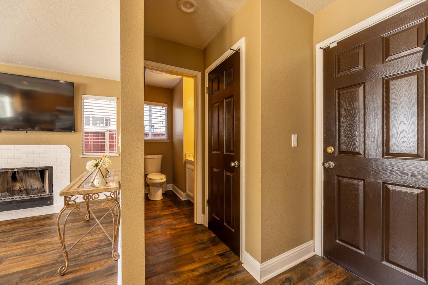 1118 Eagle Drive Salinas, CA 93905 - Photo 9 of 30 a view of a livingroom with wooden floor and a fireplace