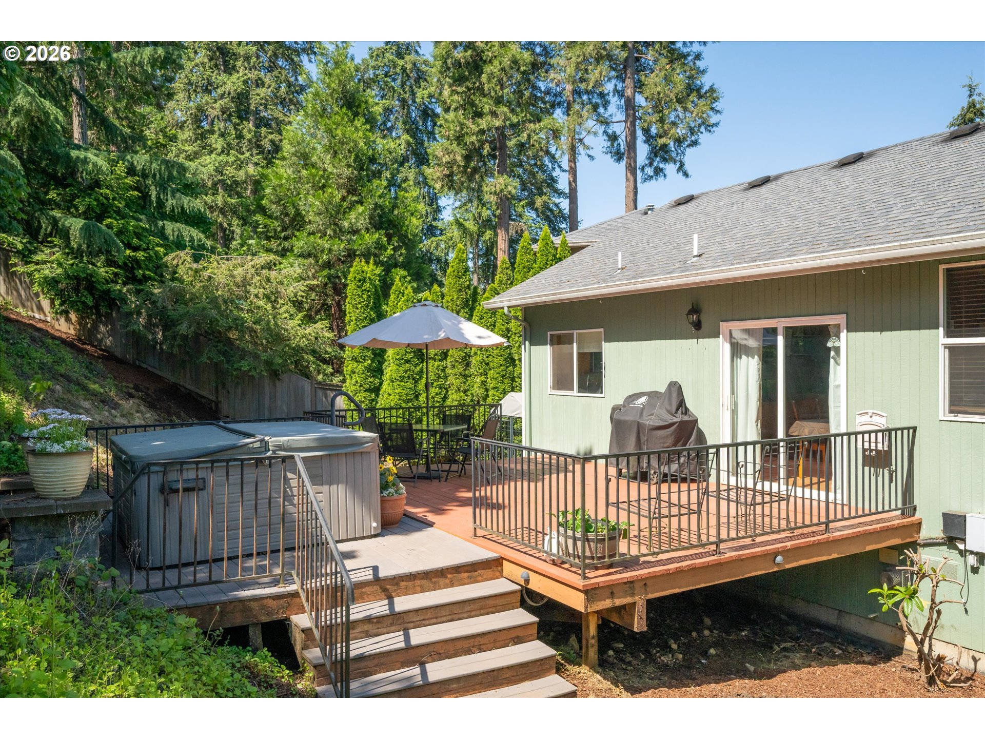 277 South 67th Court Springfield, OR 97478 - Photo 32 of 44 a view of a deck with furniture and a yard