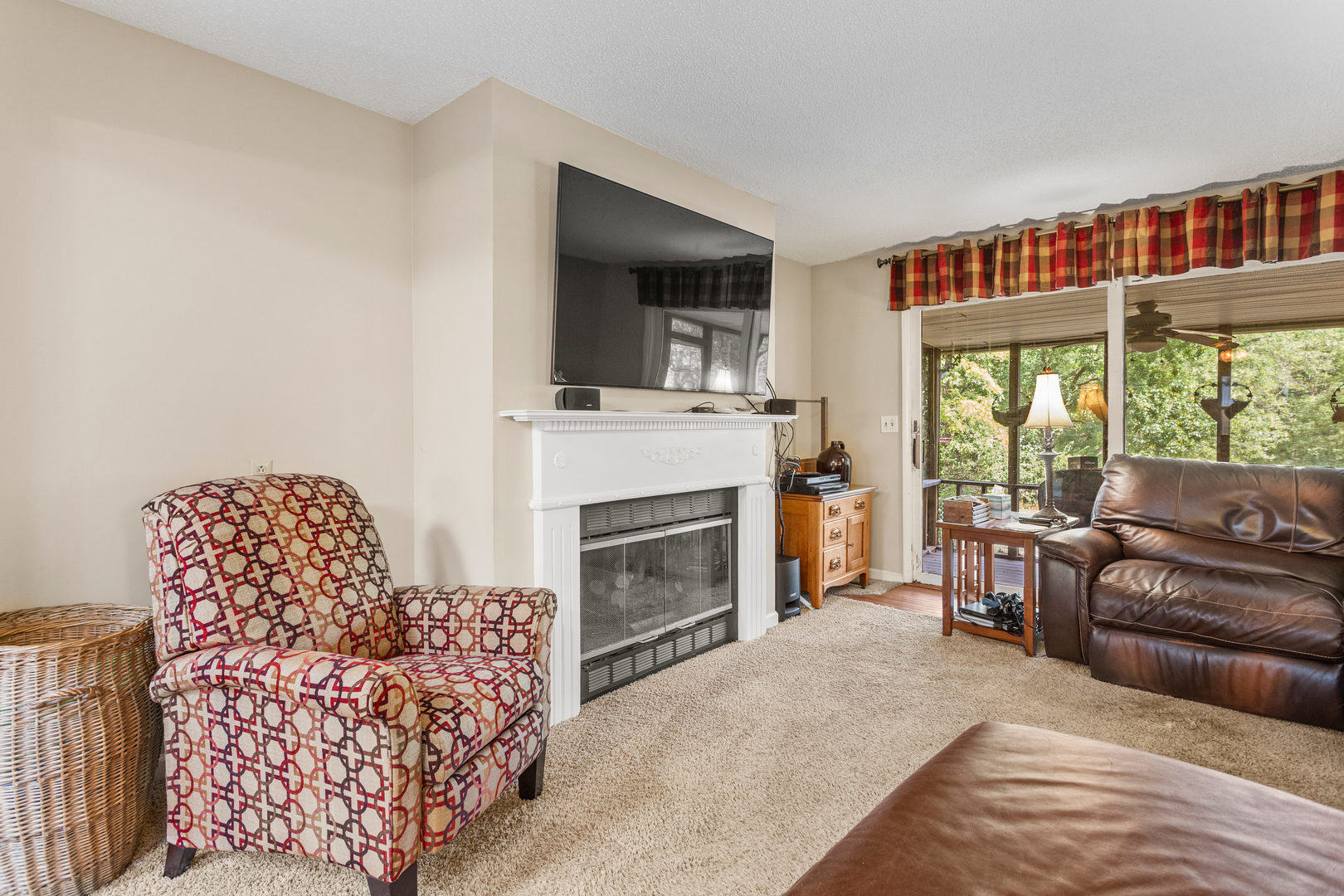 2073 Coyote Run Road Monticello, IL 61856 - Photo 17 of 42 a living room with furniture fireplace and flat screen tv