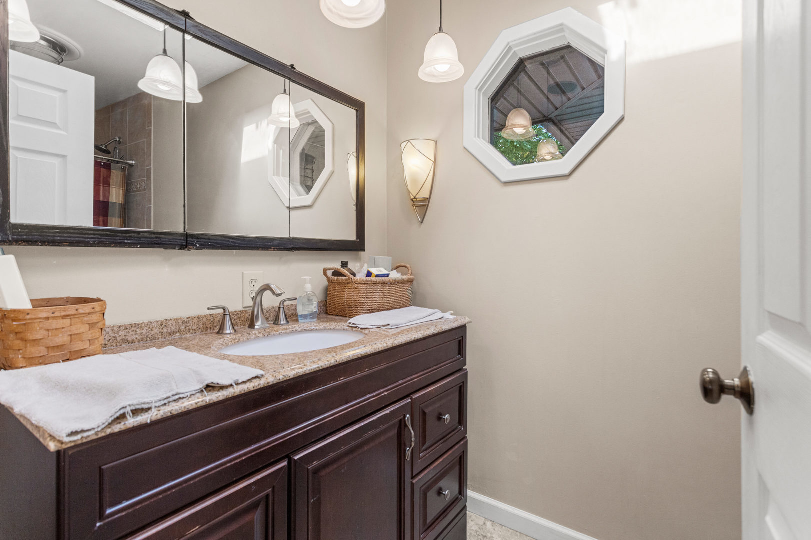2073 Coyote Run Road Monticello, IL 61856 - Photo 22 of 42 a bathroom with a sink and a mirror
