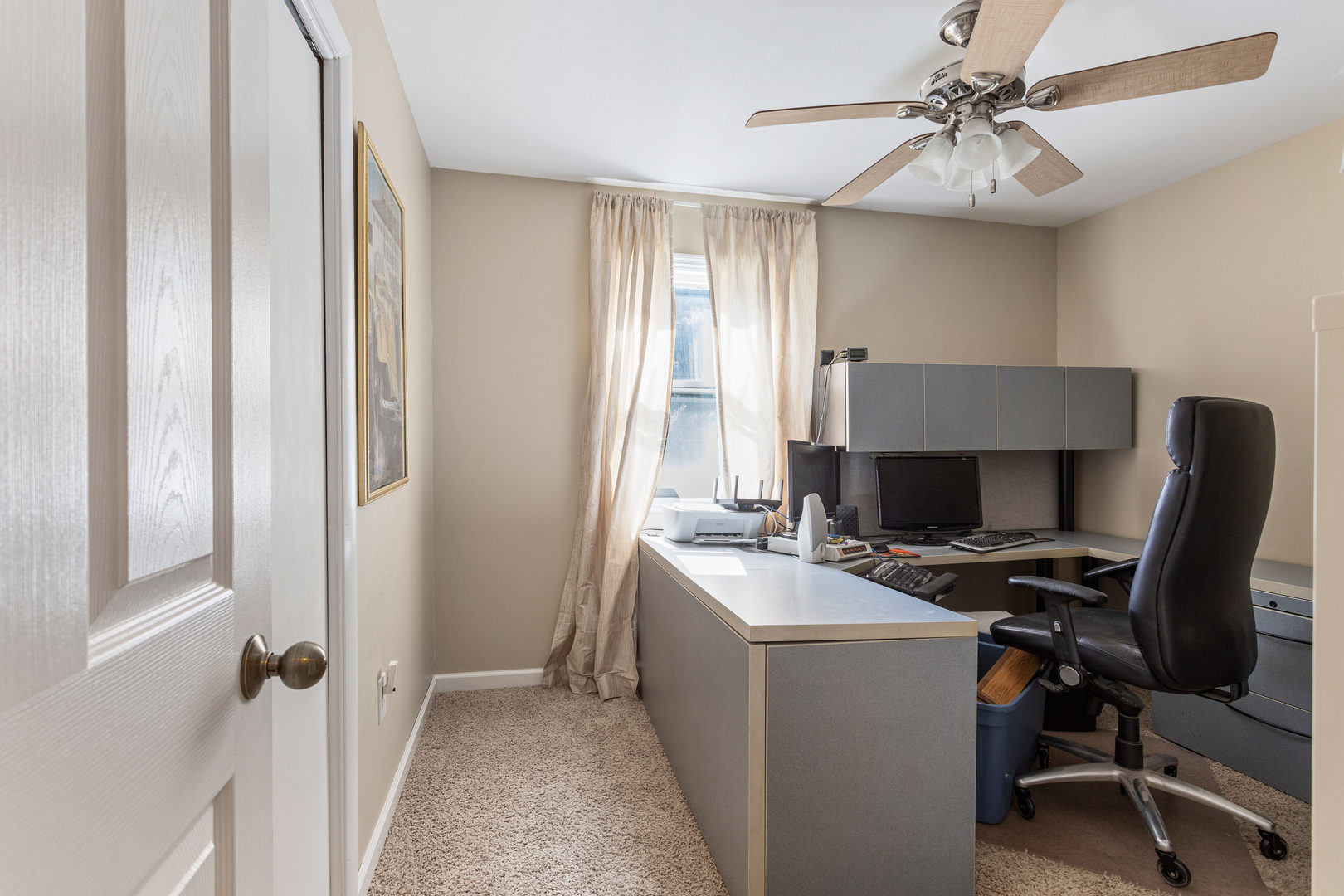 2073 Coyote Run Road Monticello, IL 61856 - Photo 24 of 42 a view of a workspace with furniture and a window