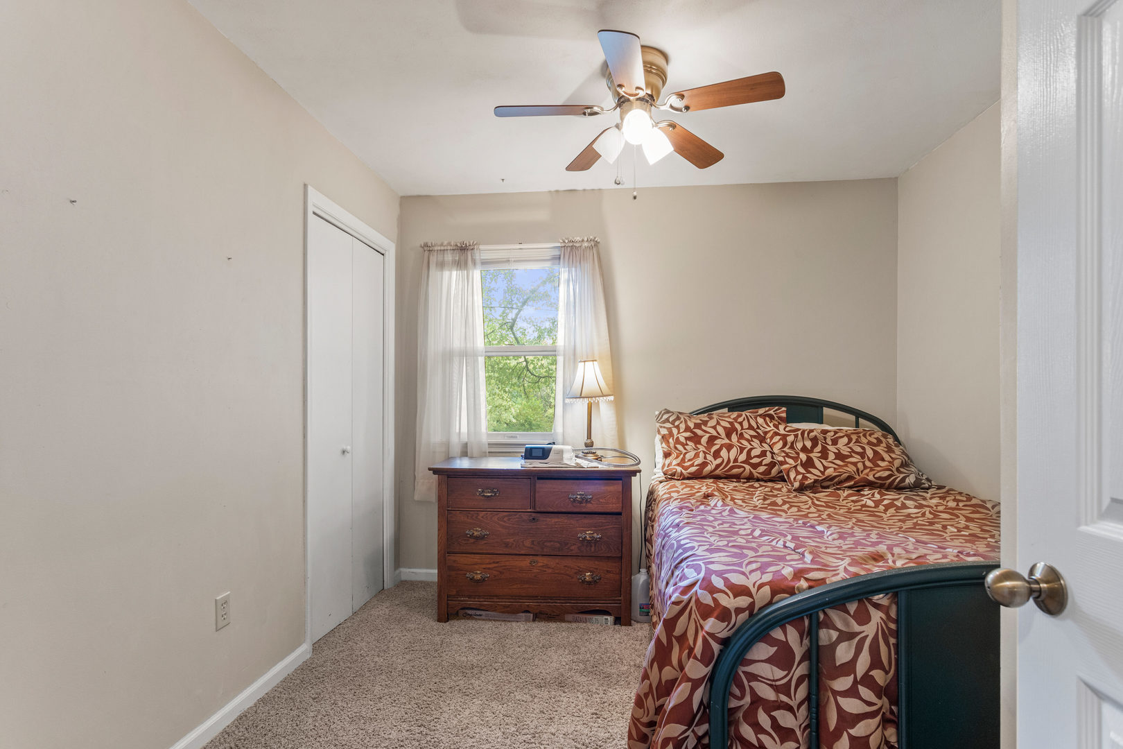 2073 Coyote Run Road Monticello, IL 61856 - Photo 26 of 42 a bed room with a bed and a window