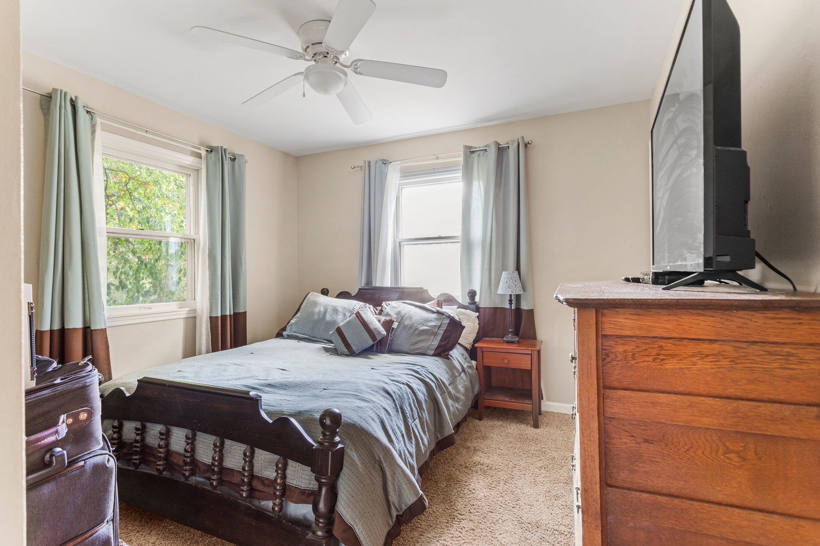 2073 Coyote Run Road Monticello, IL 61856 - Photo 29 of 42 a bedroom with a bed and a dresser