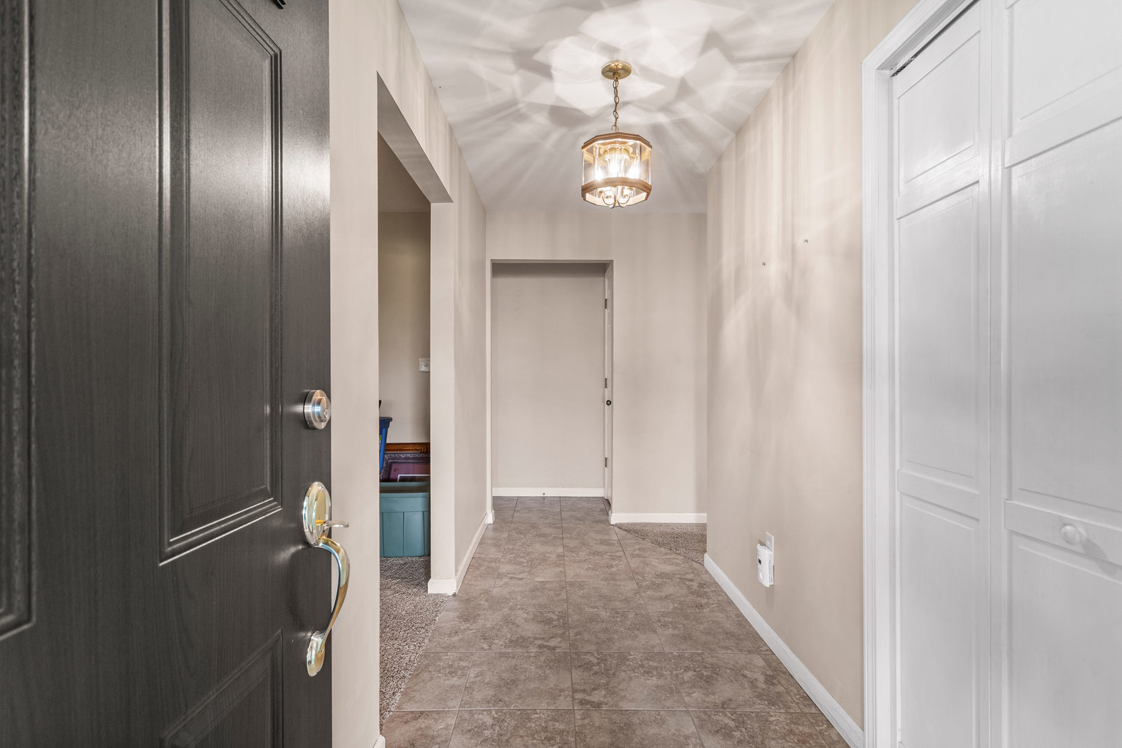 2073 Coyote Run Road Monticello, IL 61856 - Photo 4 of 42 a view of a hallway with wooden floor