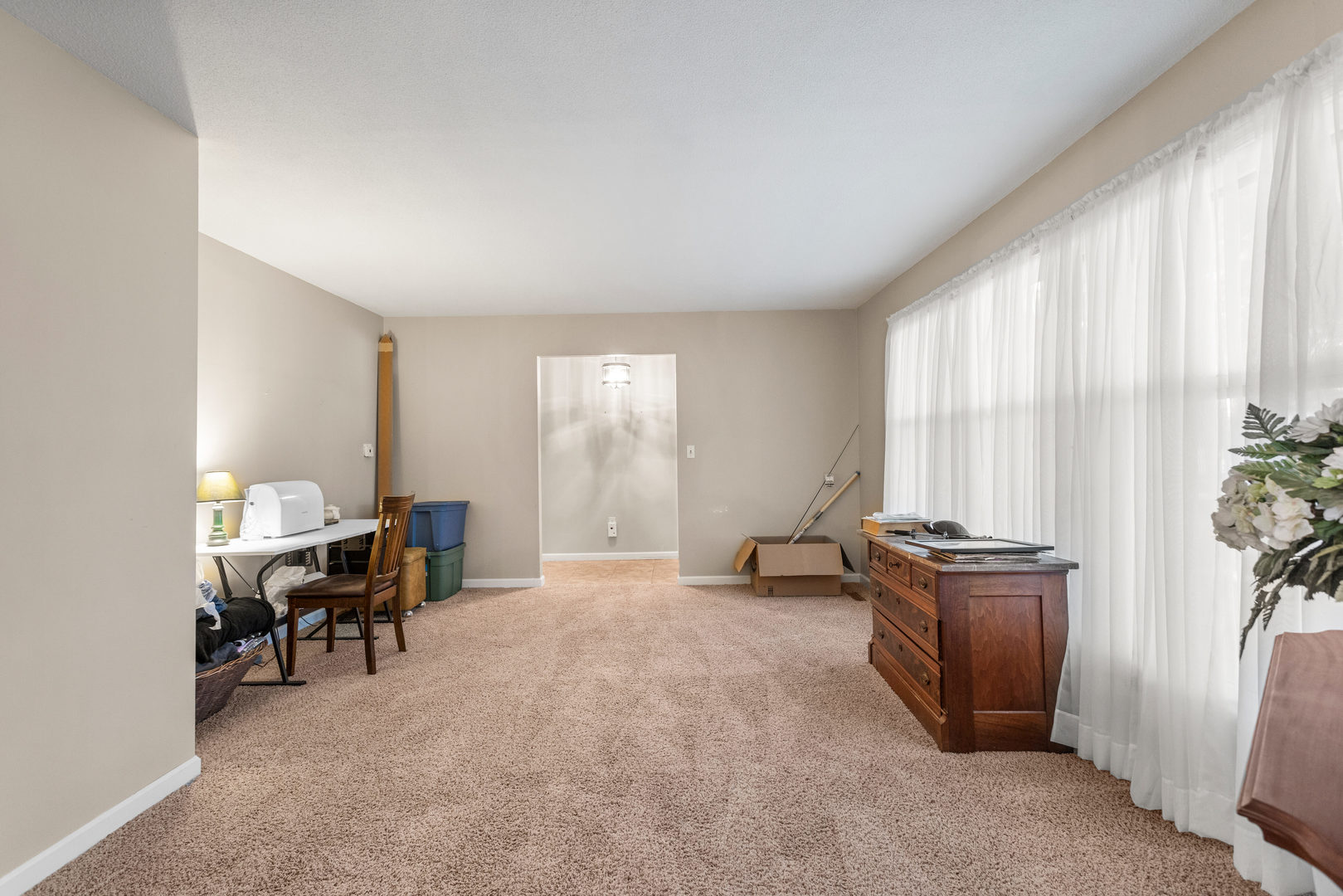 2073 Coyote Run Road Monticello, IL 61856 - Photo 6 of 42 a view of a livingroom with furniture and window