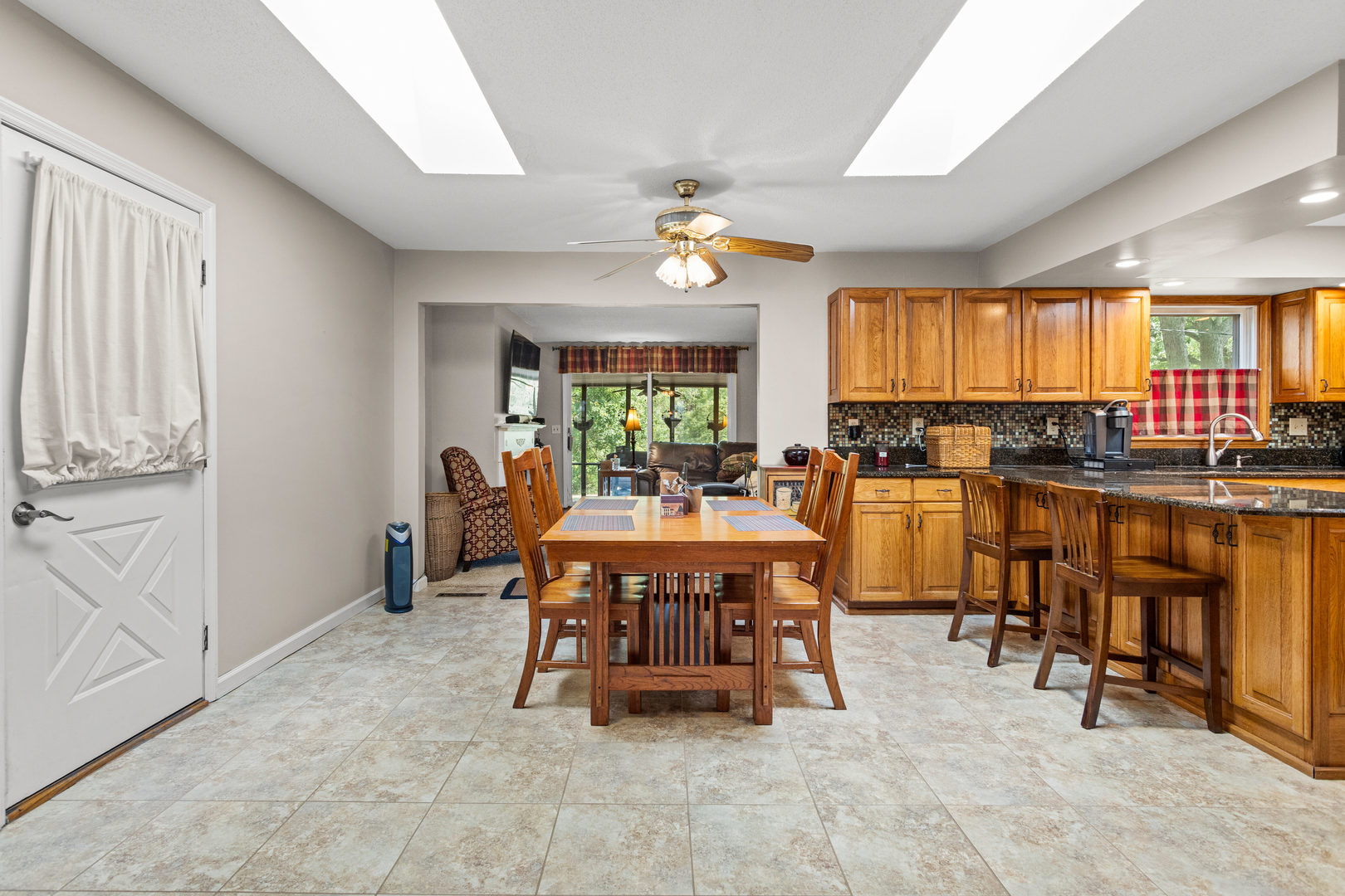 2073 Coyote Run Road Monticello, IL 61856 - Photo 10 of 42 a view of a dining room with furniture window and outside view