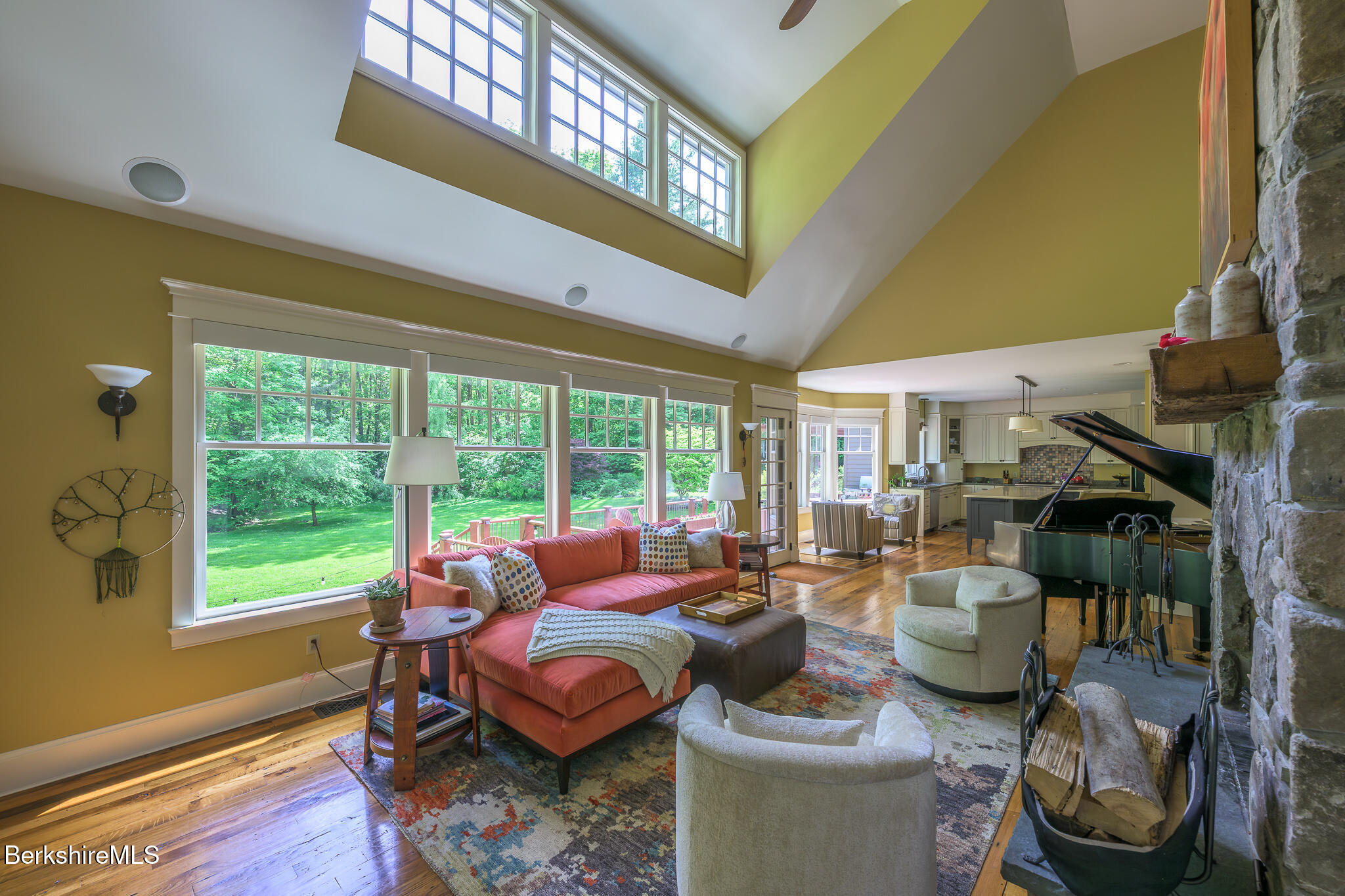 430 Lenox Road Richmond, MA 01254 - Photo 21 of 66 a living room with furniture and a floor to ceiling window