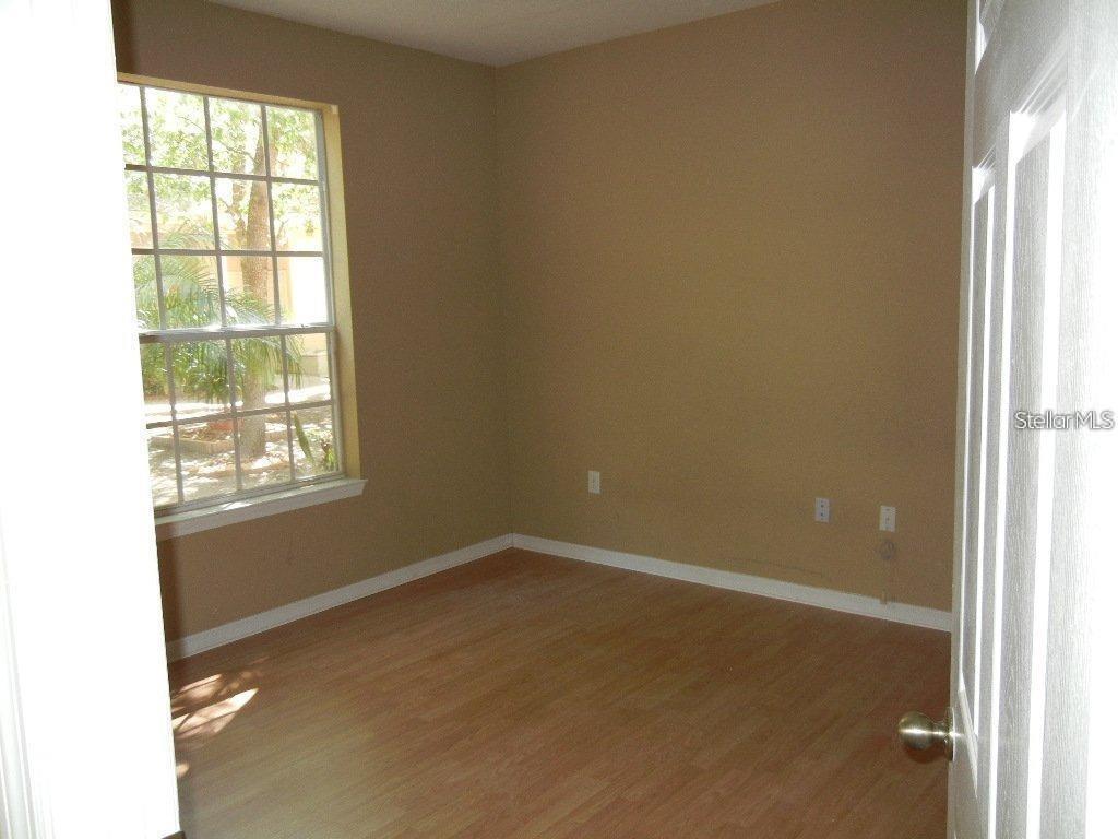 873 Grand Regency Pointe, Unit 105 Altamonte Springs, FL 32714 - Photo 16 of 24 a room that has a window in it