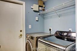 2120 Northwest Marsh Rabbit Lane Jensen Beach, FL 34957 - Photo 34 of 34 a utility room with dryer and washer