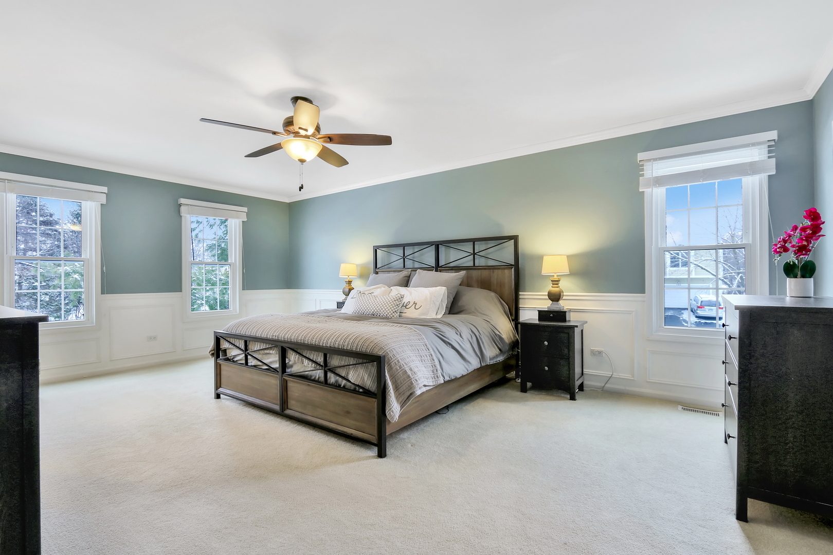 4665 Middle Road Gurnee, IL 60031 - Photo 22 of 46 a bedroom with a bed and a chandelier