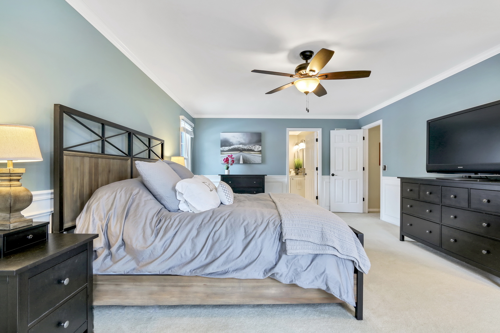 4665 Middle Road Gurnee, IL 60031 - Photo 23 of 46 a bedroom with a bed and a flat screen tv