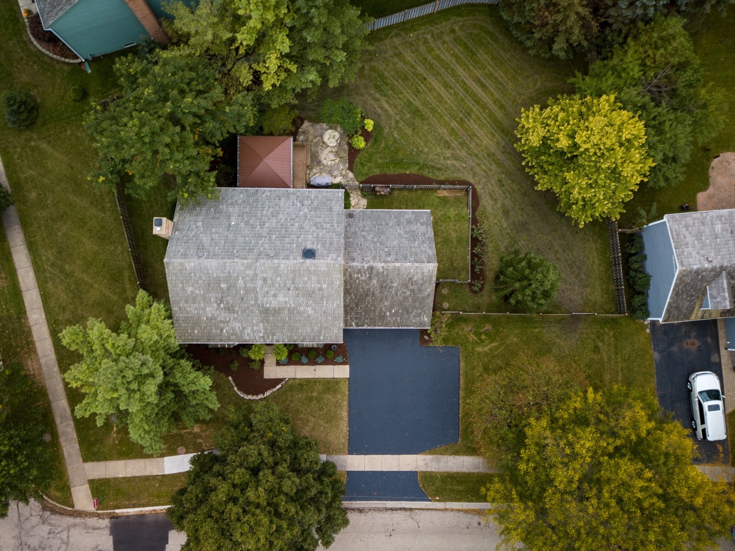 4665 Middle Road Gurnee, IL 60031 - Photo 4 of 46 an aerial view of a house with a yard