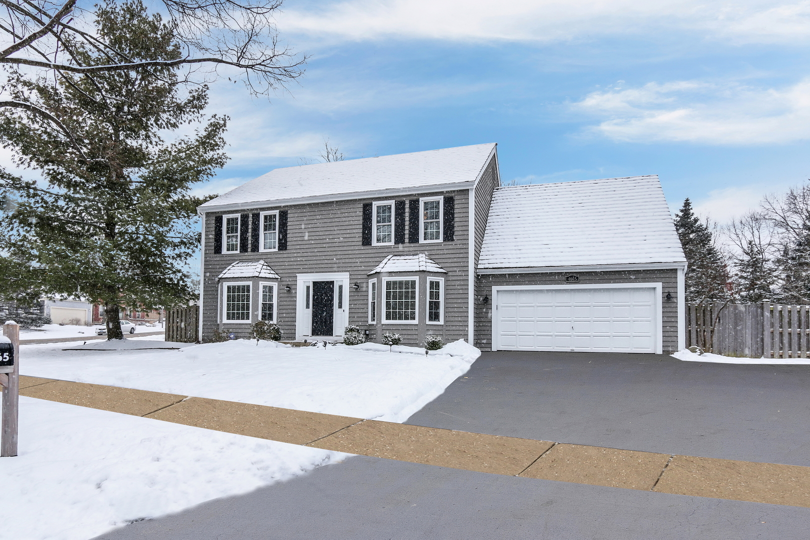 4665 Middle Road Gurnee, IL 60031 - Photo 42 of 46 a front view of a house with a yard