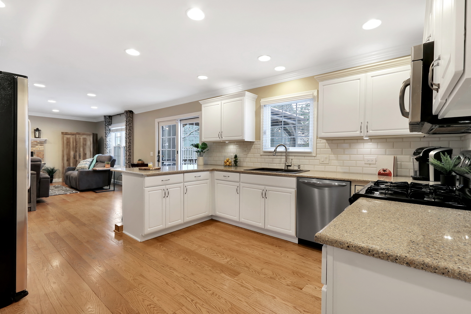 4665 Middle Road Gurnee, IL 60031 - Photo 9 of 46 a kitchen with a sink appliances cabinets and a counter top space