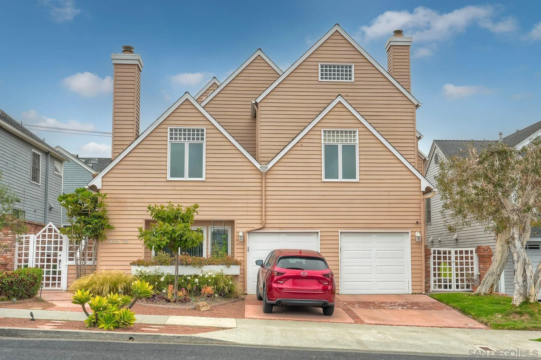 7635 Draper Avenue La Jolla, CA 92037 - Photo 12 of 43 a view of a house with a yard