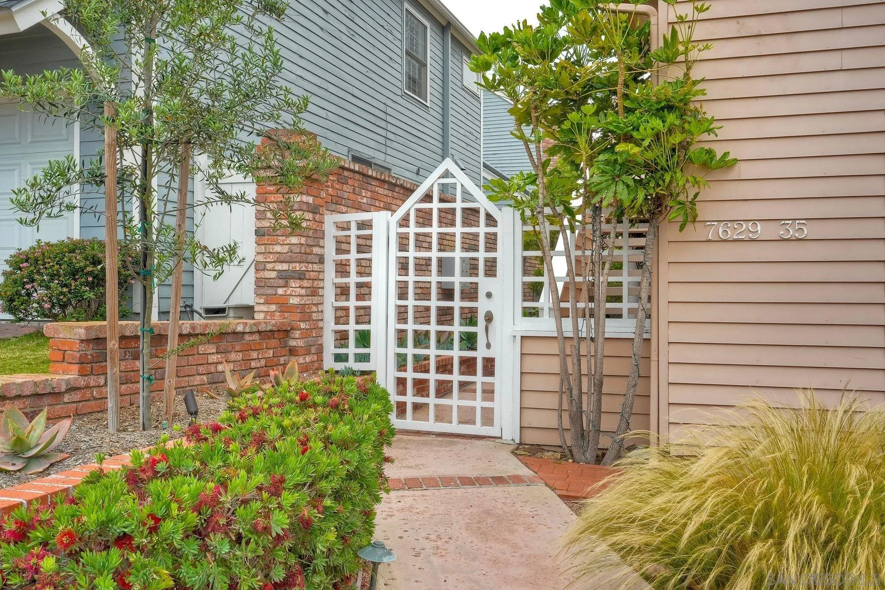 7635 Draper Avenue La Jolla, CA 92037 - Photo 14 of 43 a view of a pathway front of house