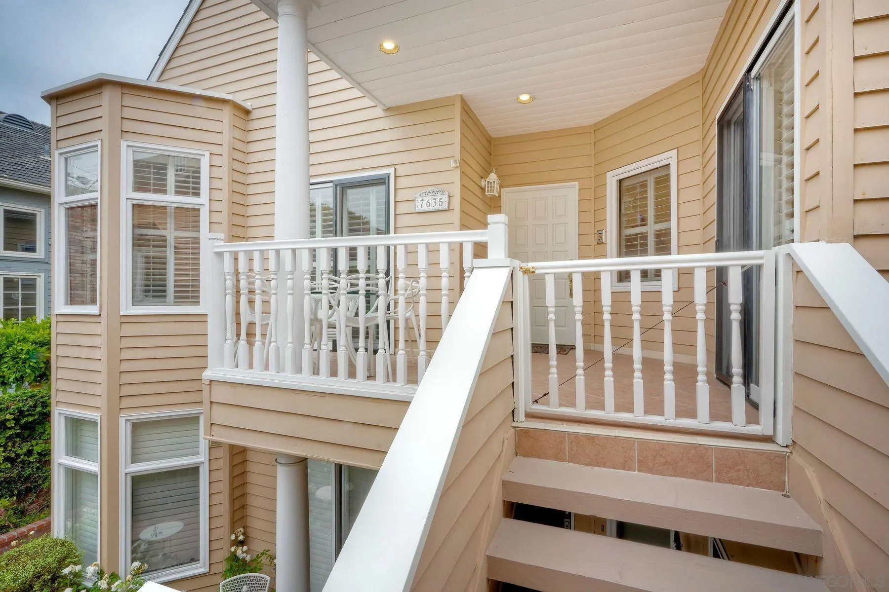 7635 Draper Avenue La Jolla, CA 92037 - Photo 18 of 43 a view of a house with wooden fence