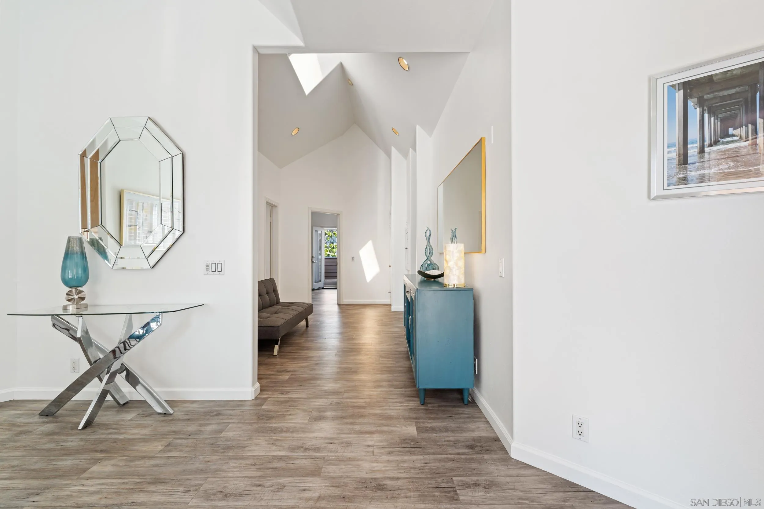 7635 Draper Avenue La Jolla, CA 92037 - Photo 19 of 43 a view of livingroom with furniture and wooden floor