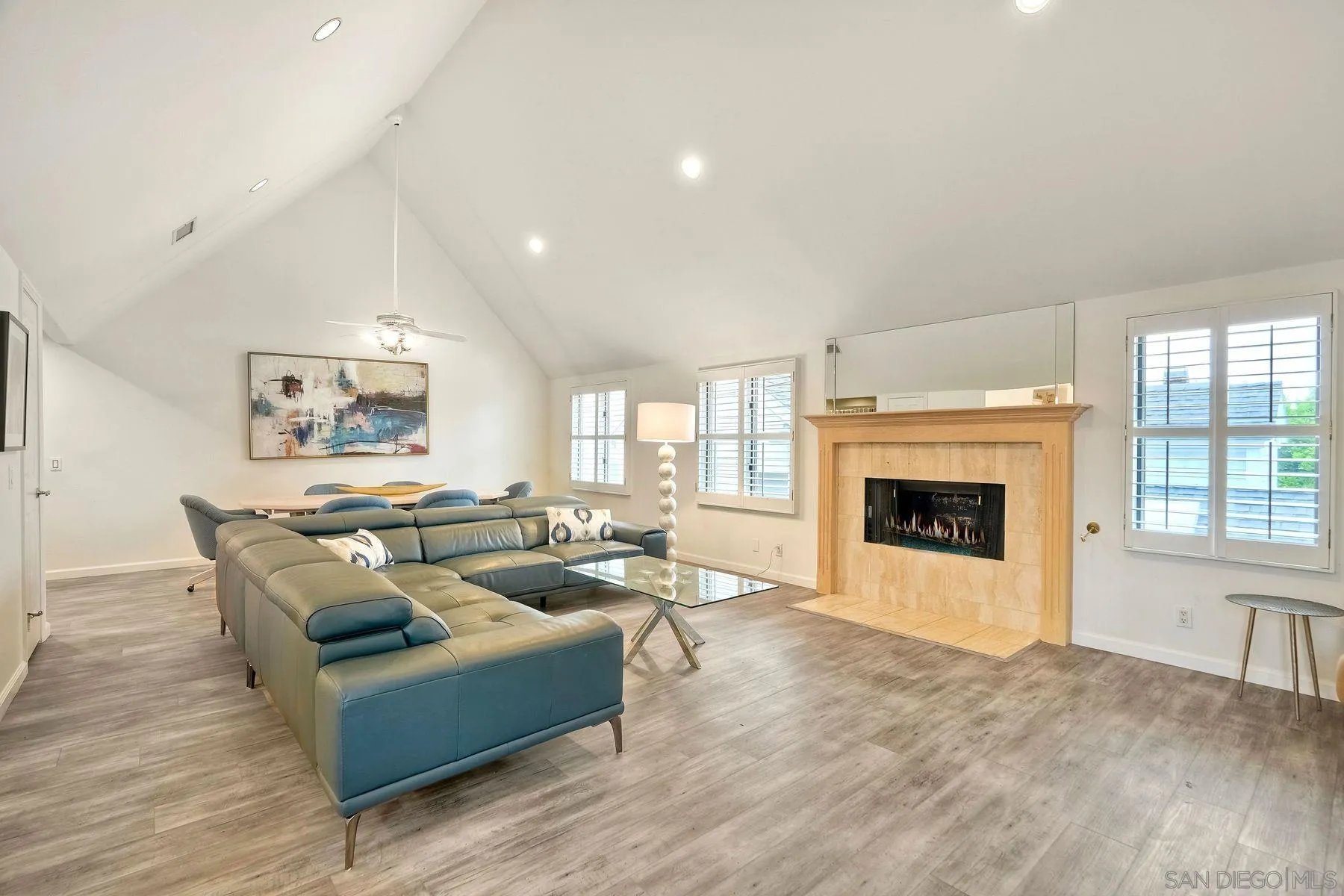 7635 Draper Avenue La Jolla, CA 92037 - Photo 25 of 43 a living room with furniture and a fireplace