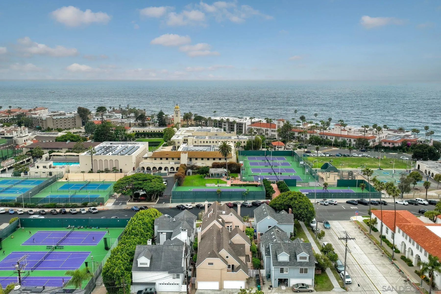 7635 Draper Avenue La Jolla, CA 92037 - Photo 3 of 43 an aerial view of a city with lots of residential buildings ocean and mountain view in back
