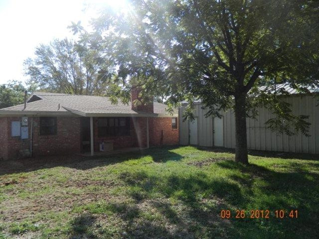 6902 Flint Avenue Lubbock, TX 79413 - Photo 5 of 10 a view of a backyard