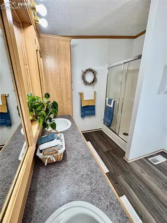 a living room with furniture floor and a rug