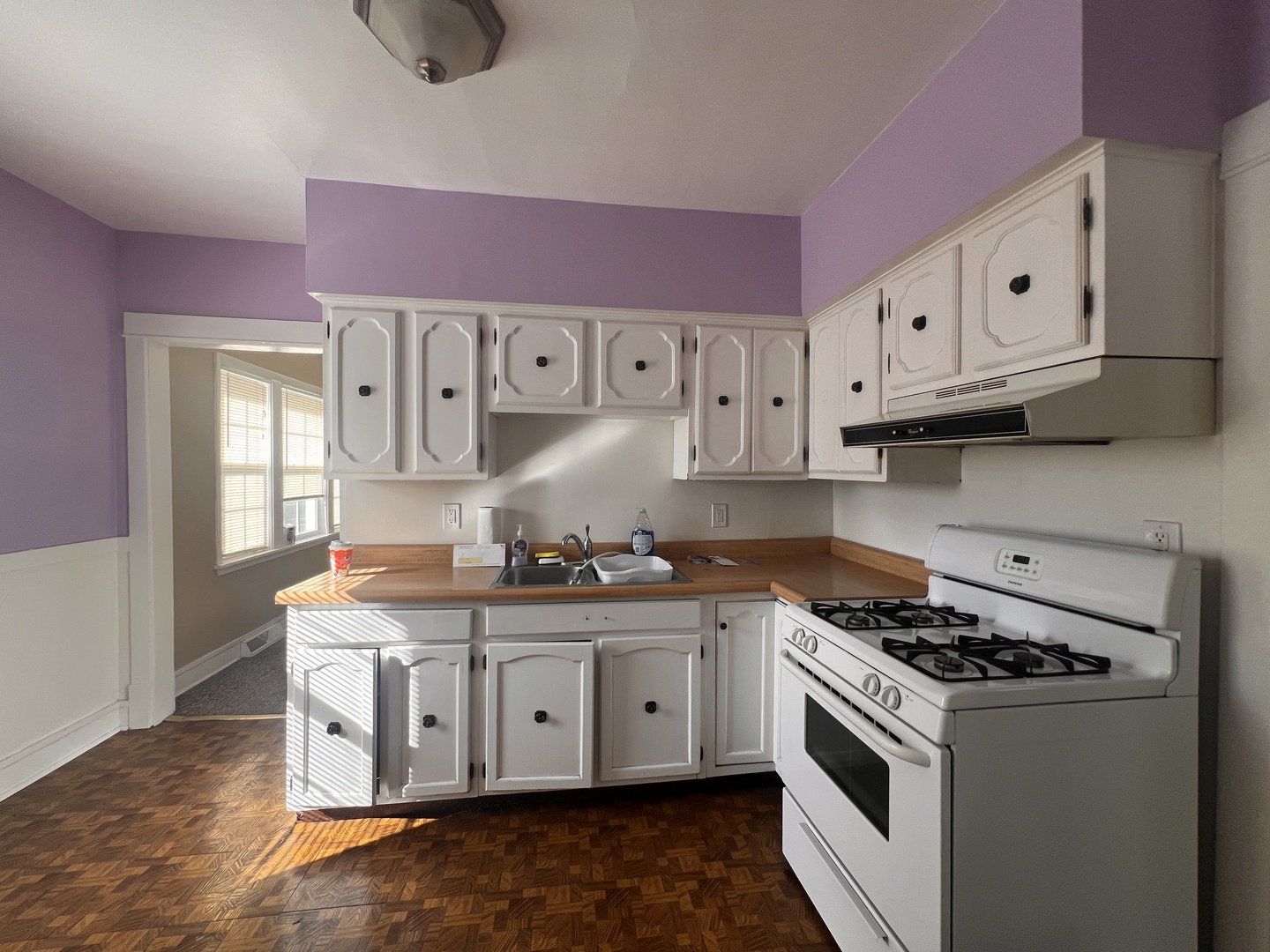 18451 Klimm Avenue Homewood, IL 60430 - Photo 7 of 15 a kitchen with granite countertop a sink stove and cabinets