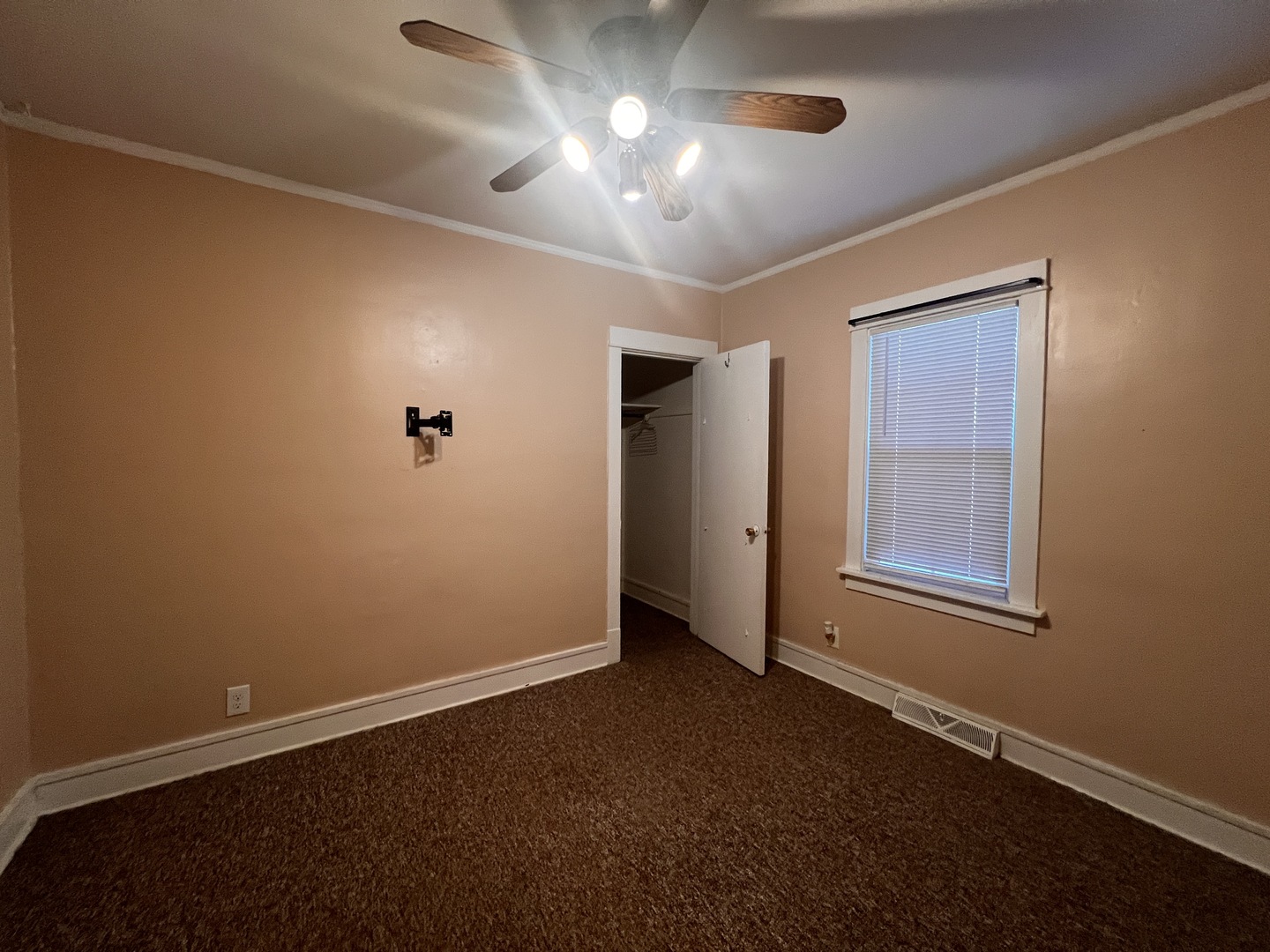 18451 Klimm Avenue Homewood, IL 60430 - Photo 9 of 15 an empty room with windows and fan