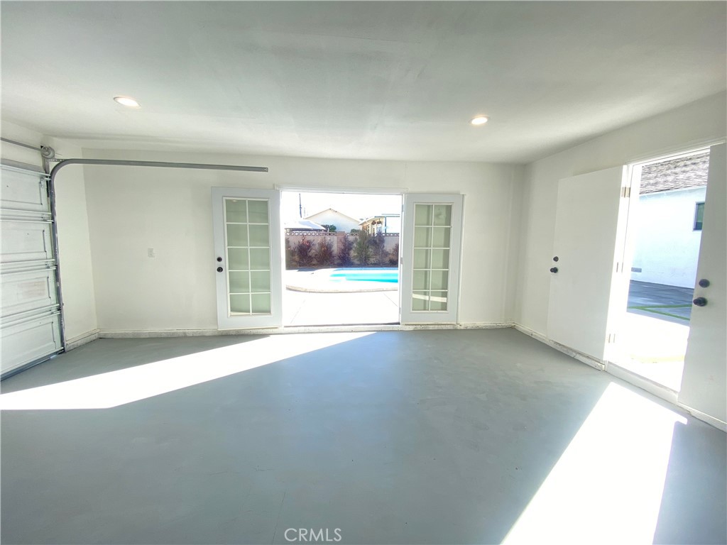 1313 West Avenue Fullerton, CA 92833 - Photo 19 of 20 an empty room with entrance and windows
