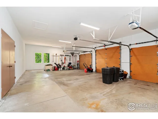 a kitchen with stainless steel appliances granite countertop a stove a sink dishwasher and a refrigerator