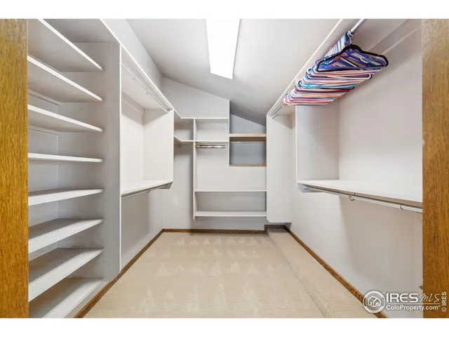 a kitchen with stainless steel appliances kitchen island granite countertop dining table and chairs