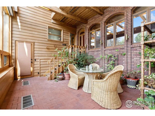 a front view of a house with patio