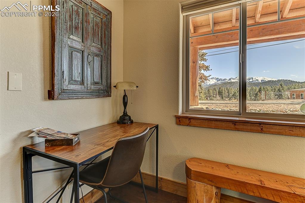 140 Dewell Road Woodland Park, CO 80863 - Photo 14 of 28 a room with a table and windows