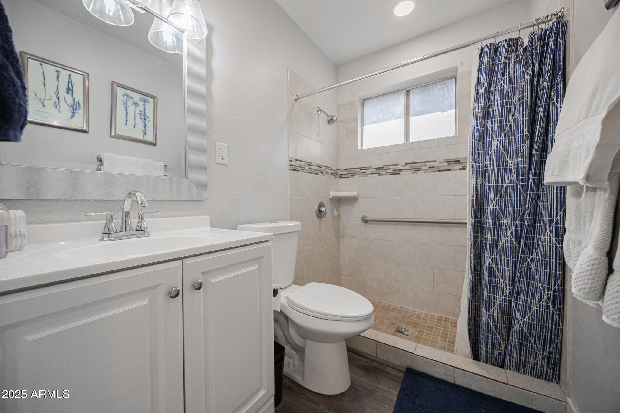 3031 South Rural Road, Unit 9 Tempe, AZ 85282 - Photo 15 of 22 a bathroom with a granite countertop sink toilet and shower