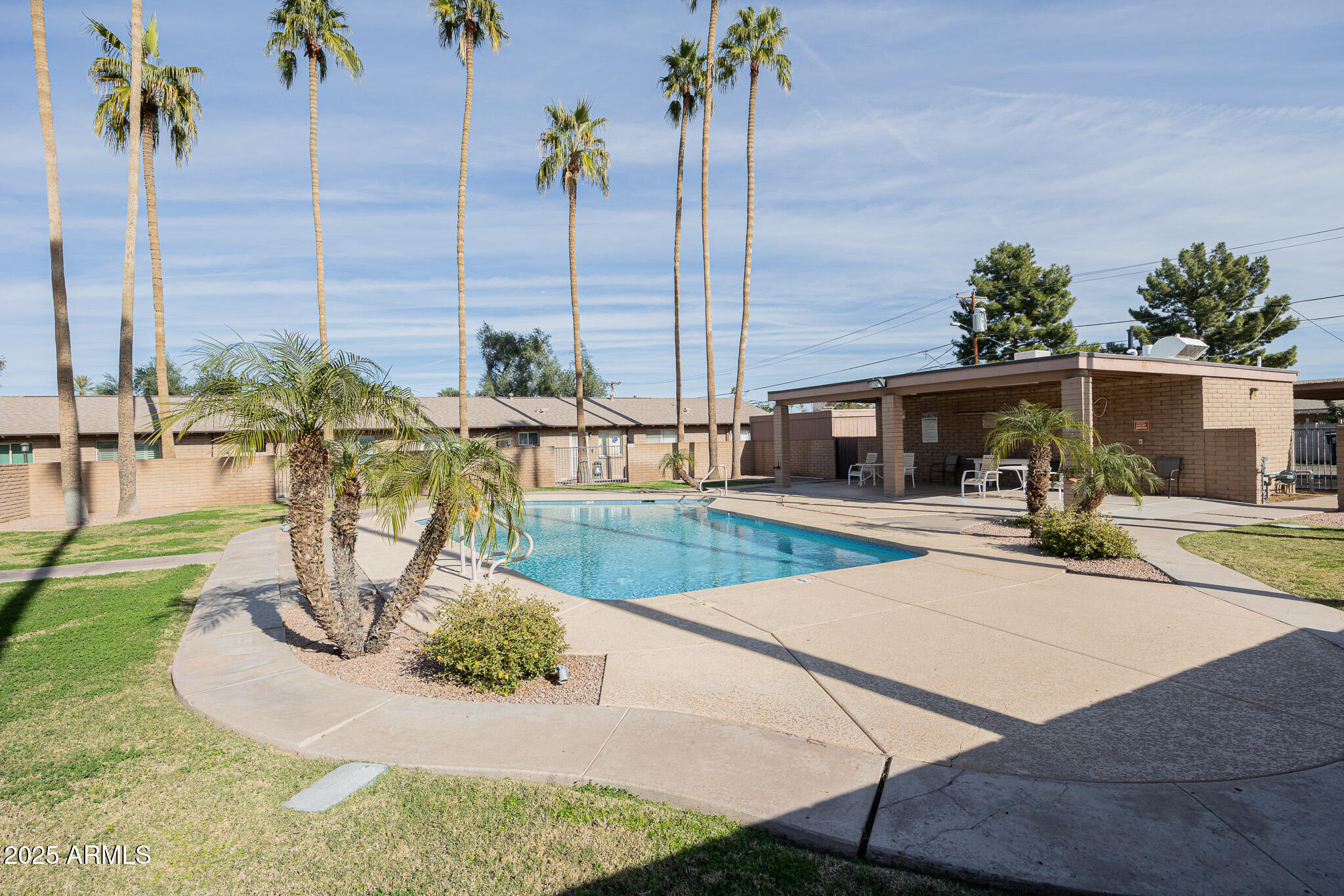 3031 South Rural Road, Unit 9 Tempe, AZ 85282 - Photo 22 of 22 a view of a house with a swimming pool
