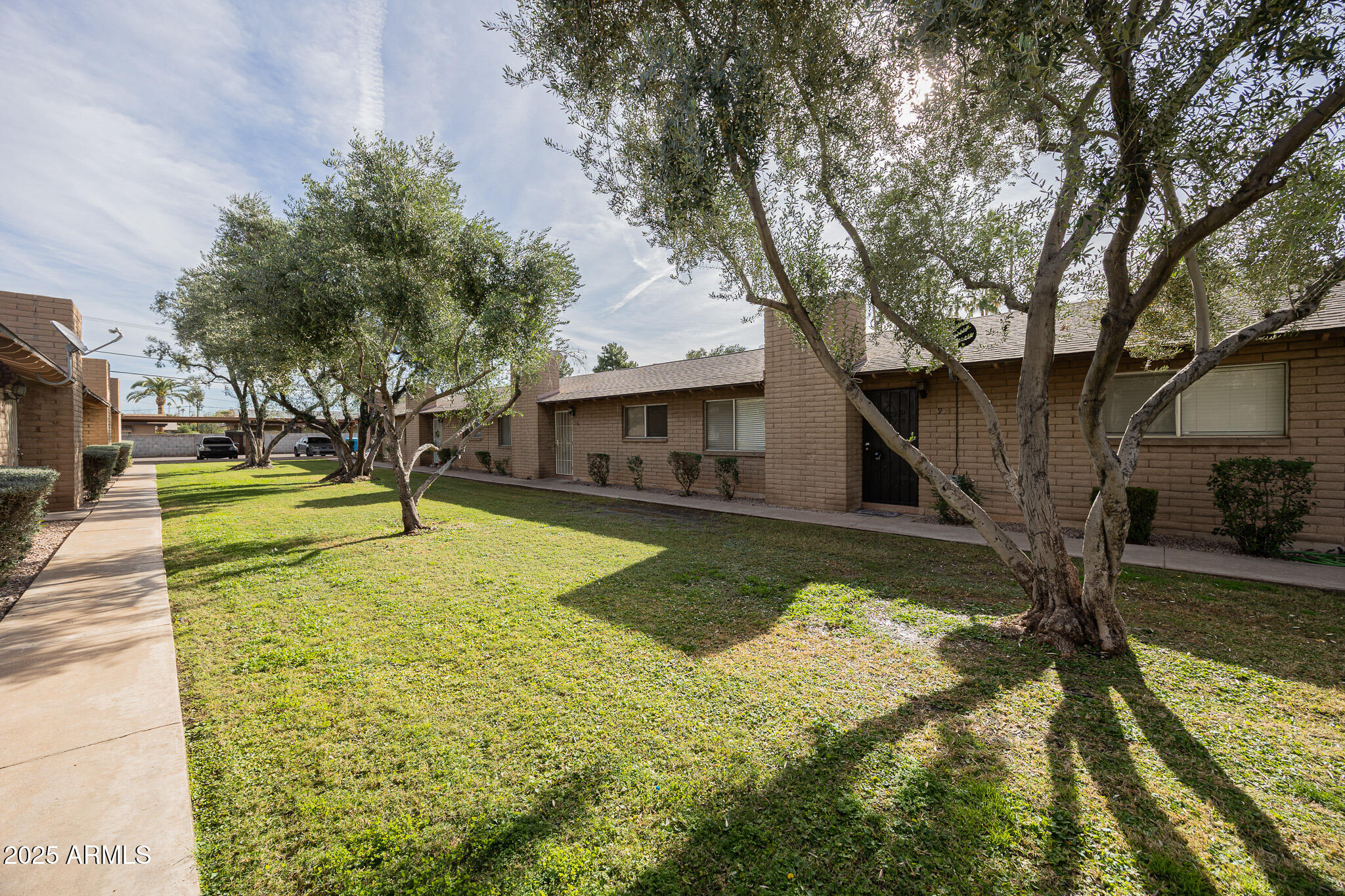 3031 South Rural Road, Unit 9 Tempe, AZ 85282 - Photo 3 of 22 a view of a house with swimming pool