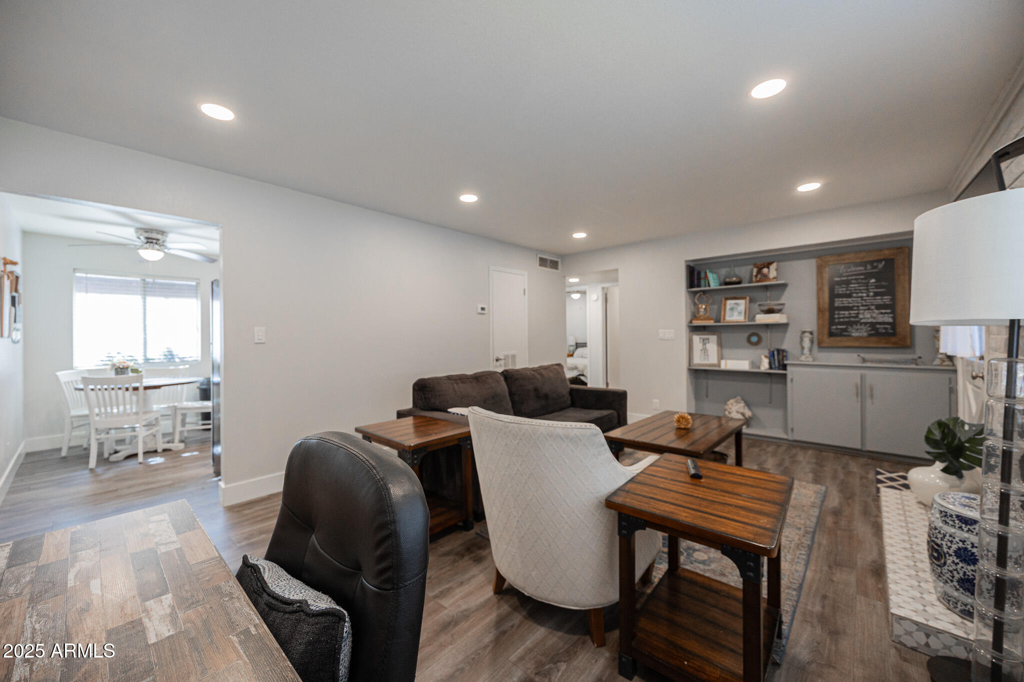 3031 South Rural Road, Unit 9 Tempe, AZ 85282 - Photo 7 of 22 a living room with furniture