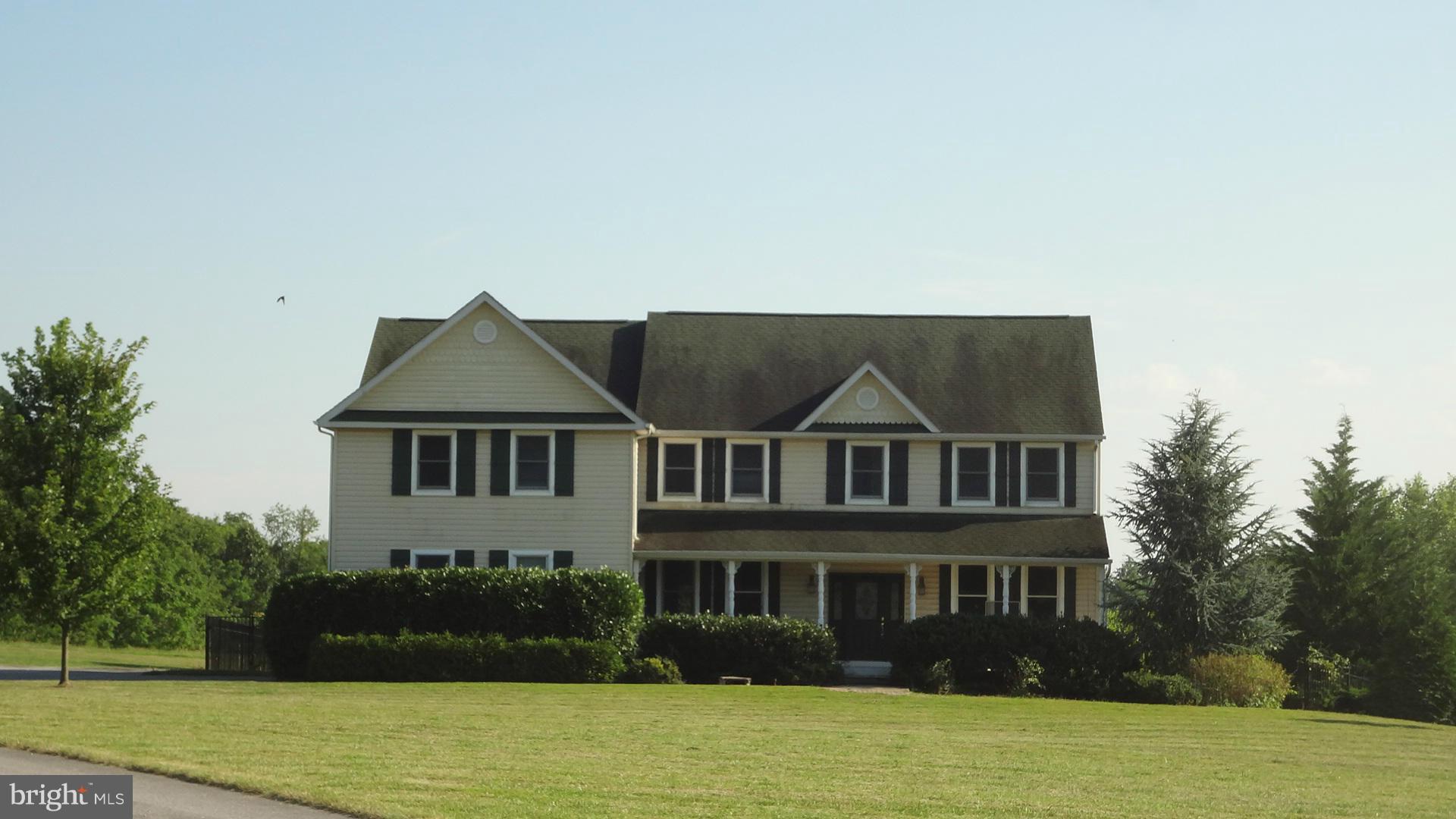 15900 Barnesville Road Boyds, MD 20841 - Photo 1 of 30 a front view of a house with garden