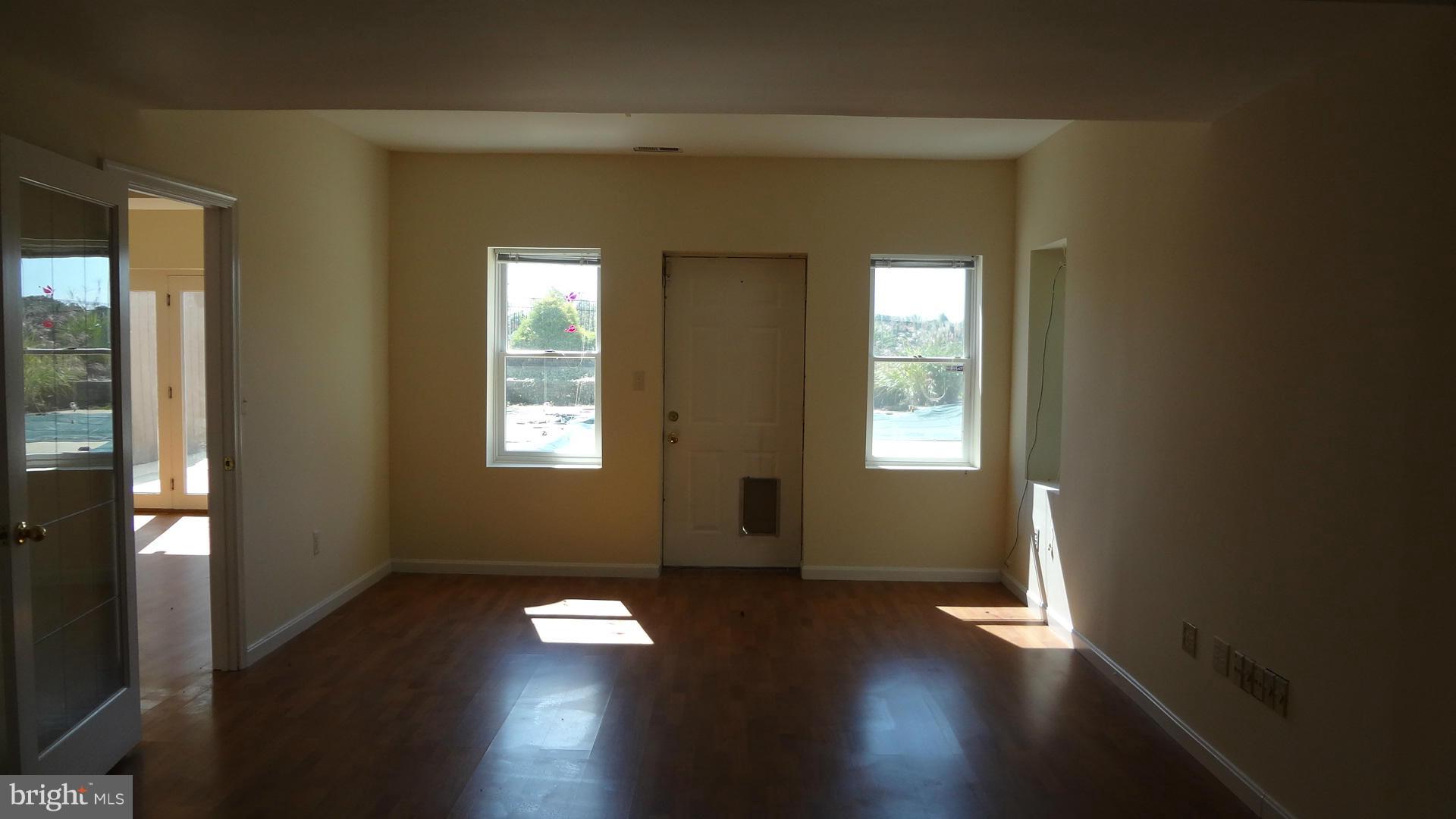 15900 Barnesville Road Boyds, MD 20841 - Photo 25 of 30 a view of empty room with wooden floor and fan