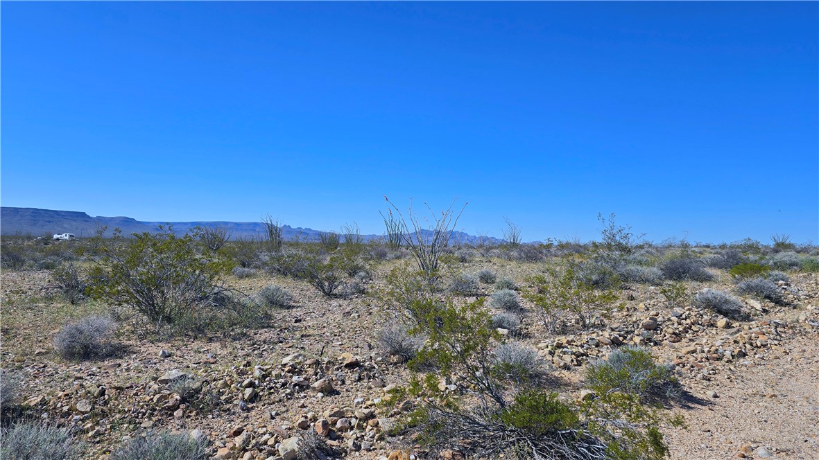 208-21-166 South Akchin Road Yucca, AZ 86438 - Photo 15 of 16 a view of a city with lush green forest