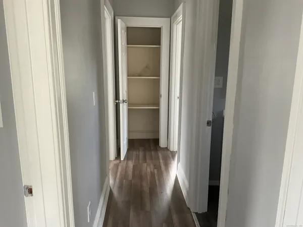 a view of a bathroom from a hallway