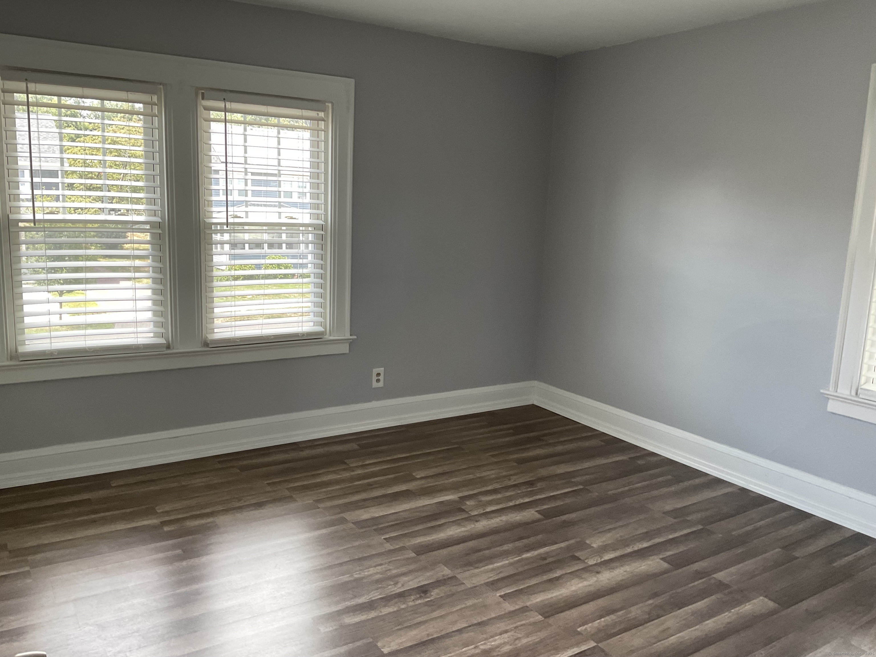 37 Westminster Street Hamden, CT 06518 - Photo 19 of 33 a view of an empty room with wooden floor and a window