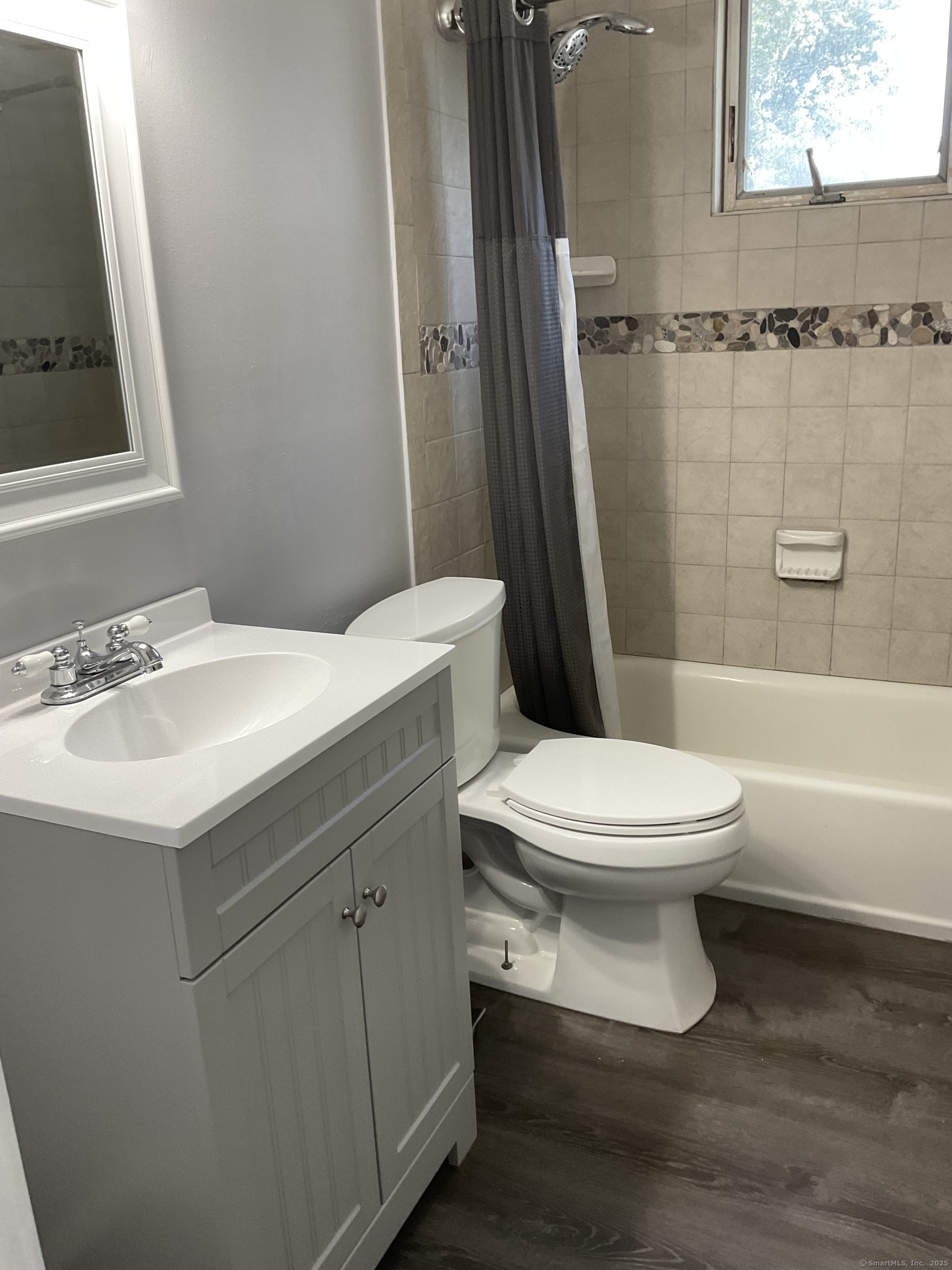 37 Westminster Street Hamden, CT 06518 - Photo 21 of 33 a white toilet sitting next to a bathroom sink