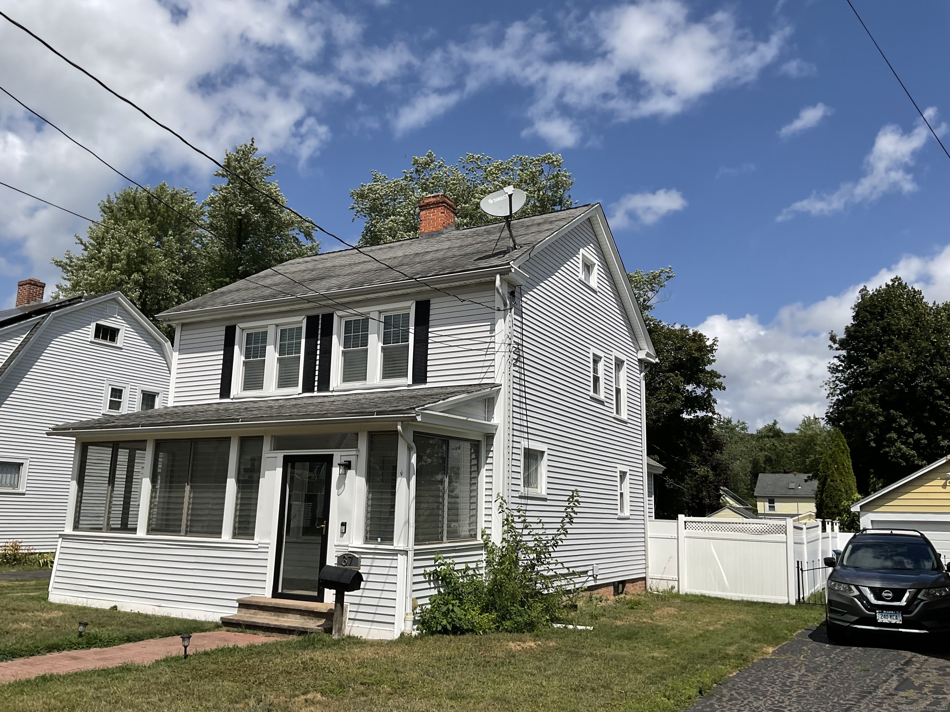 37 Westminster Street Hamden, CT 06518 - Photo 29 of 33 a view of a white house with a yard and potted plants