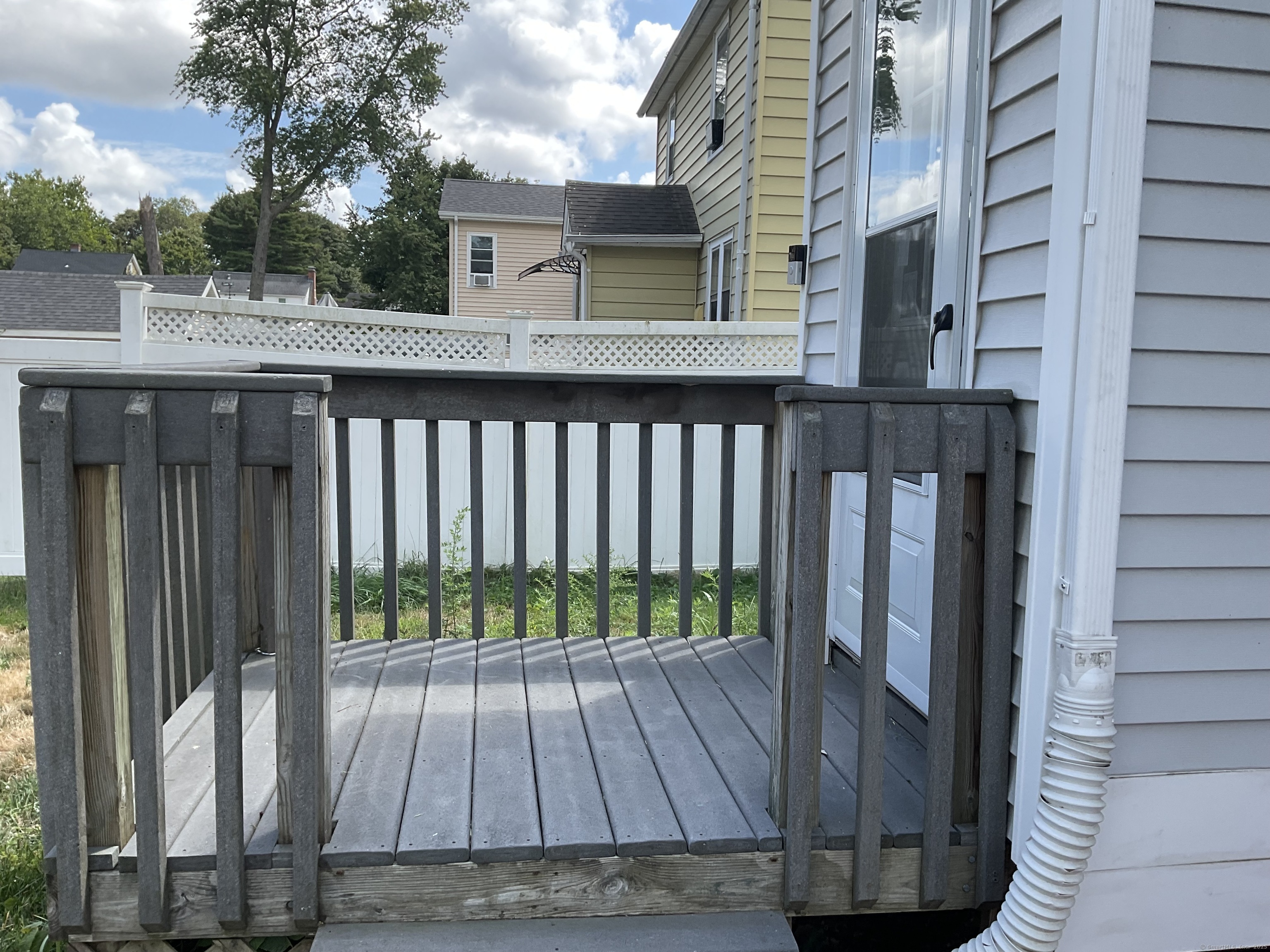 37 Westminster Street Hamden, CT 06518 - Photo 4 of 33 a view of backyard with wooden deck and floor