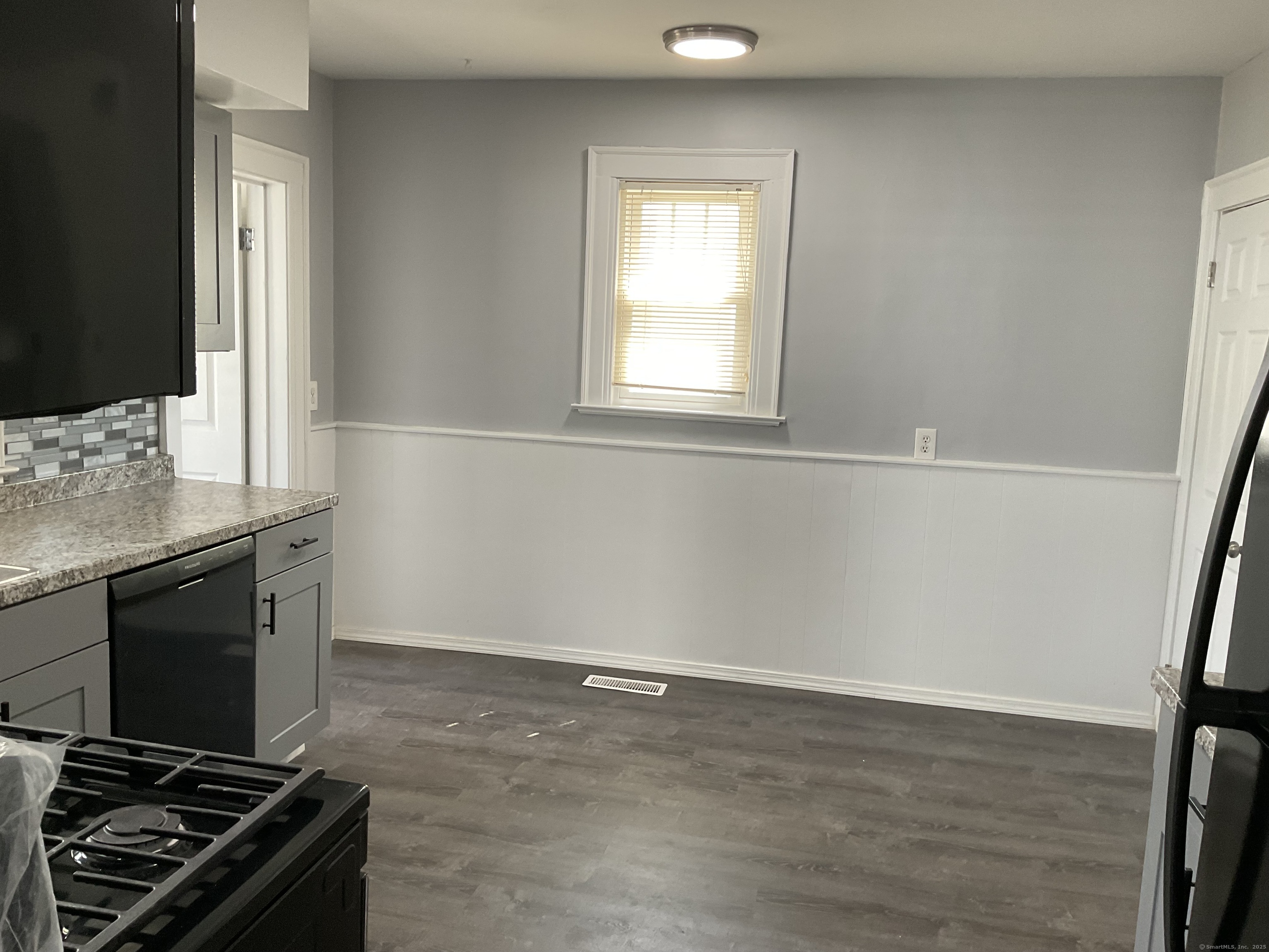37 Westminster Street Hamden, CT 06518 - Photo 7 of 33 a kitchen with a stove and a window