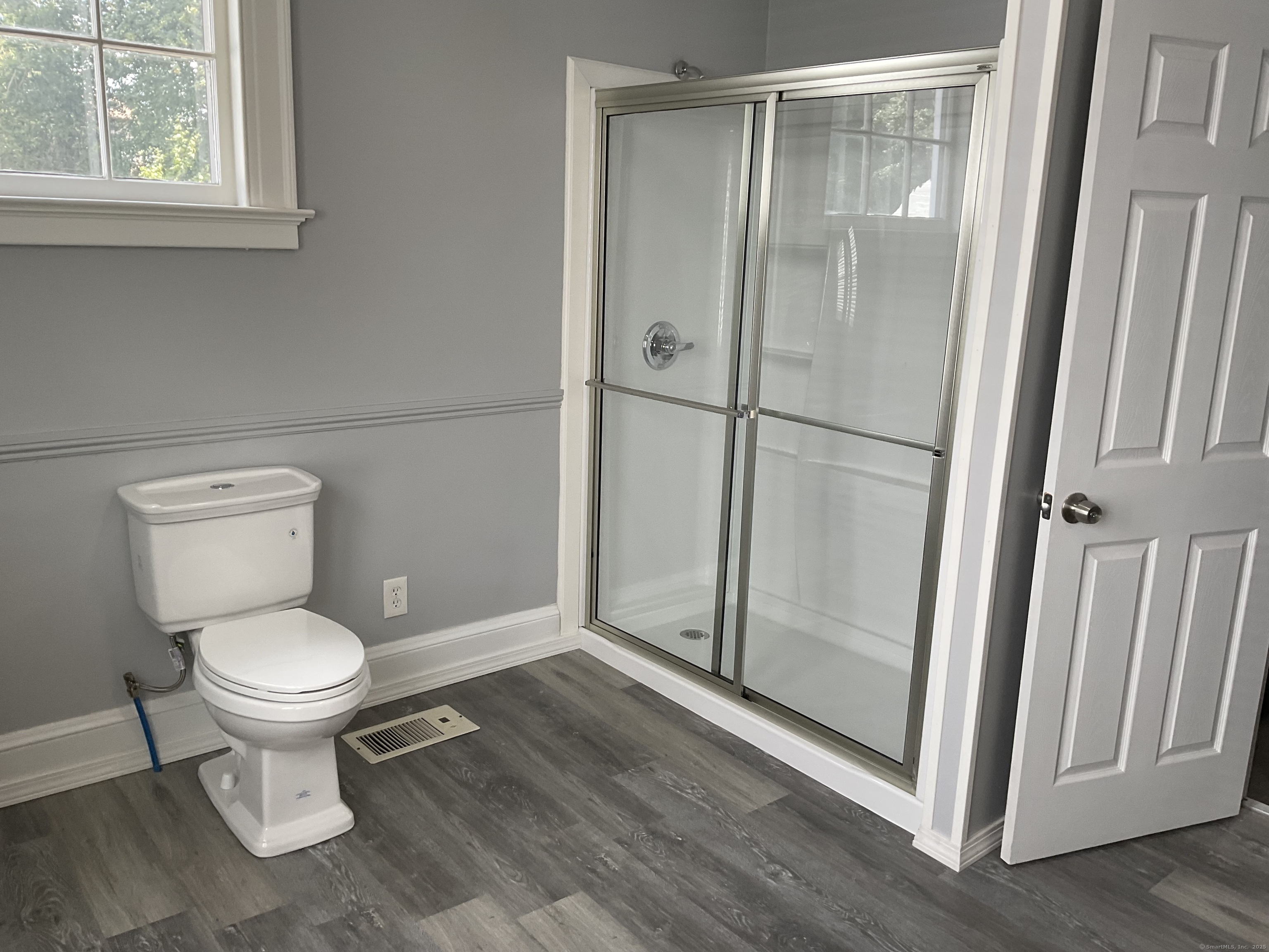 37 Westminster Street Hamden, CT 06518 - Photo 9 of 33 a white toilet sitting next to a bathroom sink